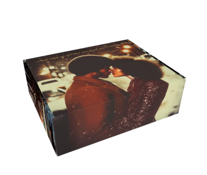 Product packaging with a couple embracing on a street at night.