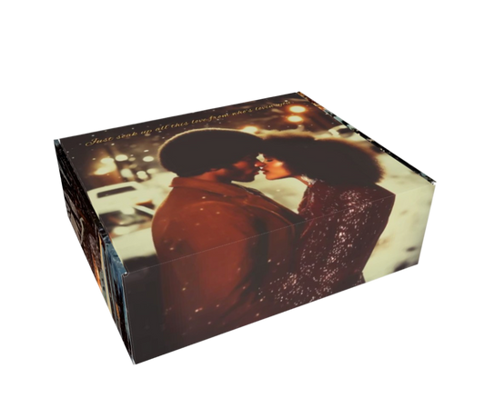 Product packaging with a couple embracing on a street at night.